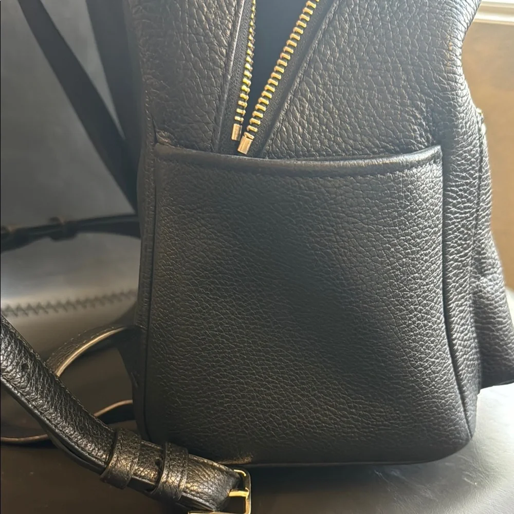 kate spade Black Pebbled Leather Mini Backpack with Gold Accents